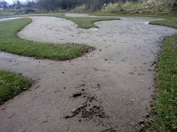 Can you help the Carlisle club restore their track after flooding?